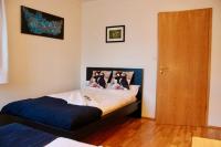 Postel nebo postele na pokoji v ubytování Guesthouse Árný