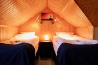 Postel nebo postele na pokoji v ubytování Guesthouse Árný