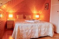 Postel nebo postele na pokoji v ubytování Guesthouse Árný