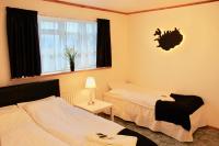 Postel nebo postele na pokoji v ubytování Guesthouse Árný
