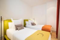 Posteľ alebo postele v izbe v ubytovaní Cosmo Apartments Passeig de Gràcia