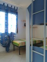 A bed or beds in a room at Casa Letizia