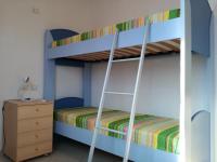 A bed or beds in a room at Casa Letizia