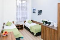 Postel nebo postele na pokoji v ubytování Apartamenty Bonerowska 5