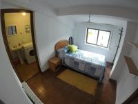 A bed or beds in a room at Alojamientos turísticos VUT-LE-043