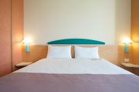 Posteľ alebo postele v izbe v ubytovaní Hotel Ibis Firenze Nord Aeroporto