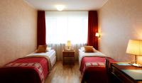Postel nebo postele na pokoji v ubytování Fosshotel Rauðará