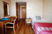 Postel nebo postele na pokoji v ubytování Fosshotel Rauðará