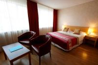 Postel nebo postele na pokoji v ubytování Fosshotel Rauðará