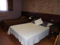 Posteľ alebo postele v izbe v ubytovaní Hotel Rural El Rocal