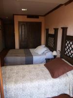 Posteľ alebo postele v izbe v ubytovaní Hotel Rural El Rocal
