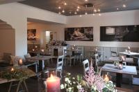 Restoran või mõni muu söögikoht majutusasutuses Hotel & Restaurant Grenzhof