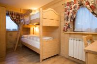 A bed or beds in a room at Hotel Restaurant La Barme