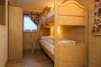 A bed or beds in a room at Hotel Restaurant La Barme