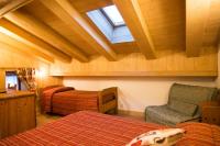 A bed or beds in a room at Hotel Restaurant La Barme