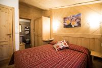 A bed or beds in a room at Hotel Restaurant La Barme