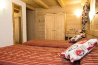 A bed or beds in a room at Hotel Restaurant La Barme