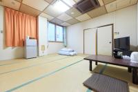ホテルセレクトイン古川 にあるベッド