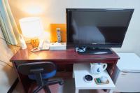 ホテルセレクトイン古川 にあるテレビまたはエンターテインメントセンター