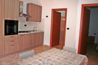A kitchen or kitchenette at Case Vacanze Pietragrande