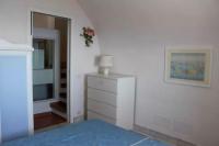 A bed or beds in a room at La Torre