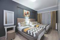 Postel nebo postele na pokoji v ubytování Serenity Suites Istanbul Airport