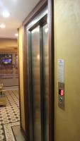 an elevator in a building with a sign on it at Merial Hotel Sultanahmet in Istanbul