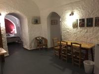 Posezení v ubytování Casas Cueva y Cortijo La Tala en Guadix