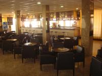 Reštaurácia alebo iné gastronomické zariadenie v ubytovaní Hotel Univers