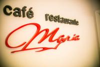 Et logo, certifikat, skilt eller en pris der bliver vist frem på Amérian Villa Maria