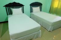Postel nebo postele na pokoji v ubytování J-Safe Guesthouse