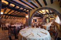 Reštaurácia alebo iné gastronomické zariadenie v ubytovaní Hotel La Venta de Goyo
