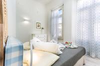 Posteľ alebo postele v izbe v ubytovaní Mediterraneo Suite Home