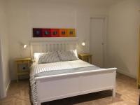 Posteľ alebo postele v izbe v ubytovaní Fafà Apartment