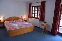 Postel nebo postele na pokoji v ubytování Hotel Růže
