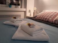 Posteľ alebo postele v izbe v ubytovaní Haustor Apartments