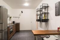 Kuchyňa alebo kuchynka v ubytovaní Industia Loft Apartment