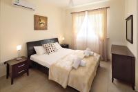Postel nebo postele na pokoji v ubytování Chloraka Terrace Apartments