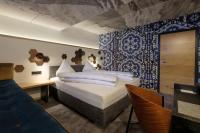Postel nebo postele na pokoji v ubytování Boutique Hotel Gams