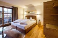 Postel nebo postele na pokoji v ubytování Boutique Hotel Gams
