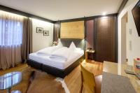 Postel nebo postele na pokoji v ubytování Boutique Hotel Gams