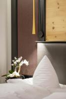 Postel nebo postele na pokoji v ubytování Boutique Hotel Gams