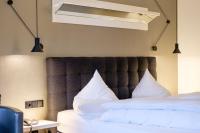 Postel nebo postele na pokoji v ubytování Boutique Hotel Gams
