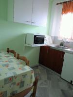 Kuchyňa alebo kuchynka v ubytovaní Grivas Apartments