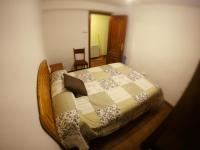 A bed or beds in a room at Alojamientos turísticos VUT-LE-043