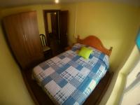A bed or beds in a room at Alojamientos turísticos VUT-LE-043