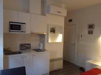 Kuchyňa alebo kuchynka v ubytovaní Haustor Apartments