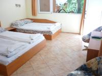 Postel nebo postele na pokoji v ubytování Nimpha Bungalows