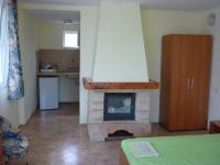 Kuchyň nebo kuchyňský kout v ubytování Nimpha Bungalows