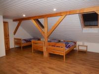 Postel nebo postele na pokoji v ubytování Apartment U Lochů